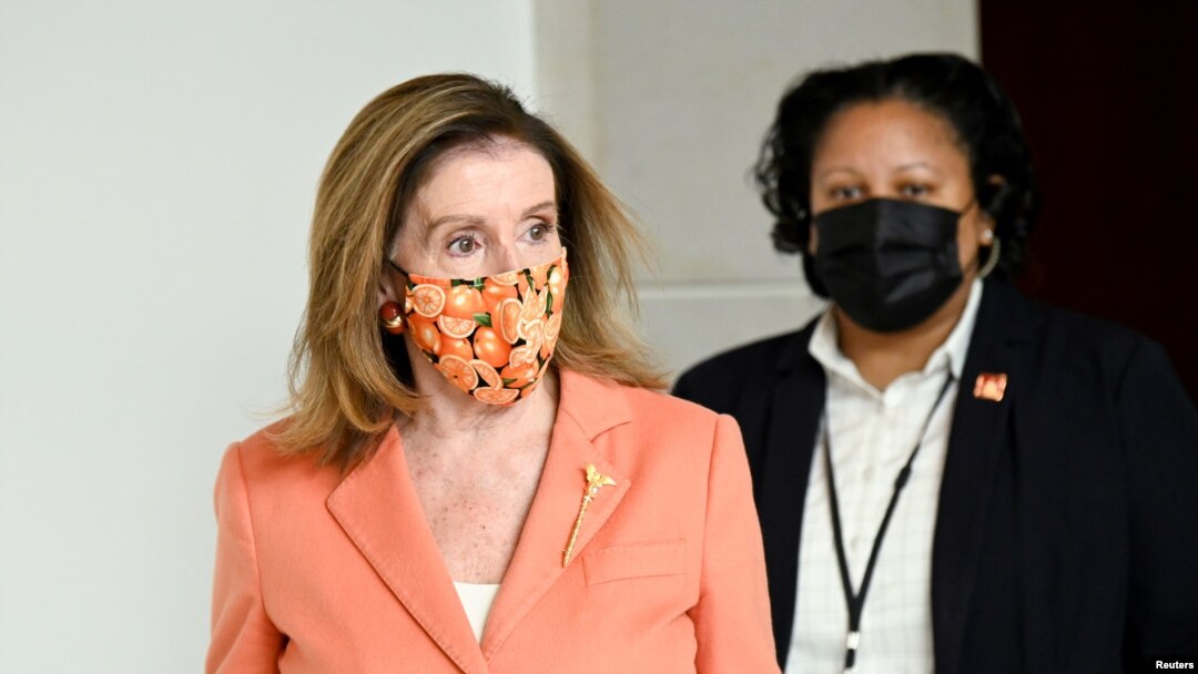 FILE - U.S. House Speaker Nancy Pelosi departs a news conference on Capitol Hill in Washington, Oct. 8, 2020. 