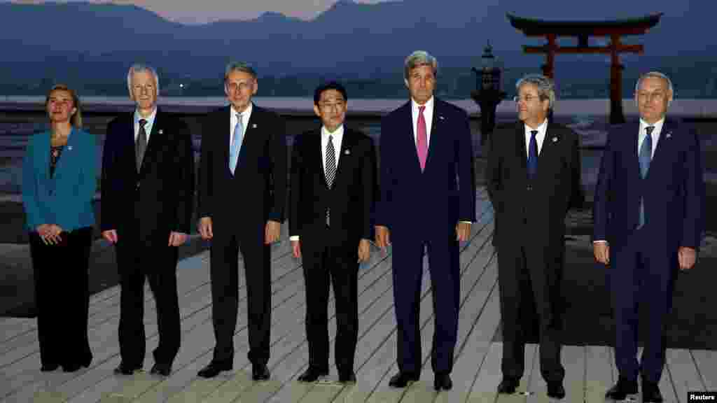 From left, E.U. High Representative for Foreign Affairs Federica Mogherini, and foreign ministers from Canada, Stephane Dion; Britain, Philip Hammond; Japan, Fumio Kishida, U.S. Secretary of State John Kerry; Italy, Paolo Gentiloni, and France Jean-Marc Ayrault at the Itsukushima Shrine, Miyajima Island, Japan, April 10, 2016.