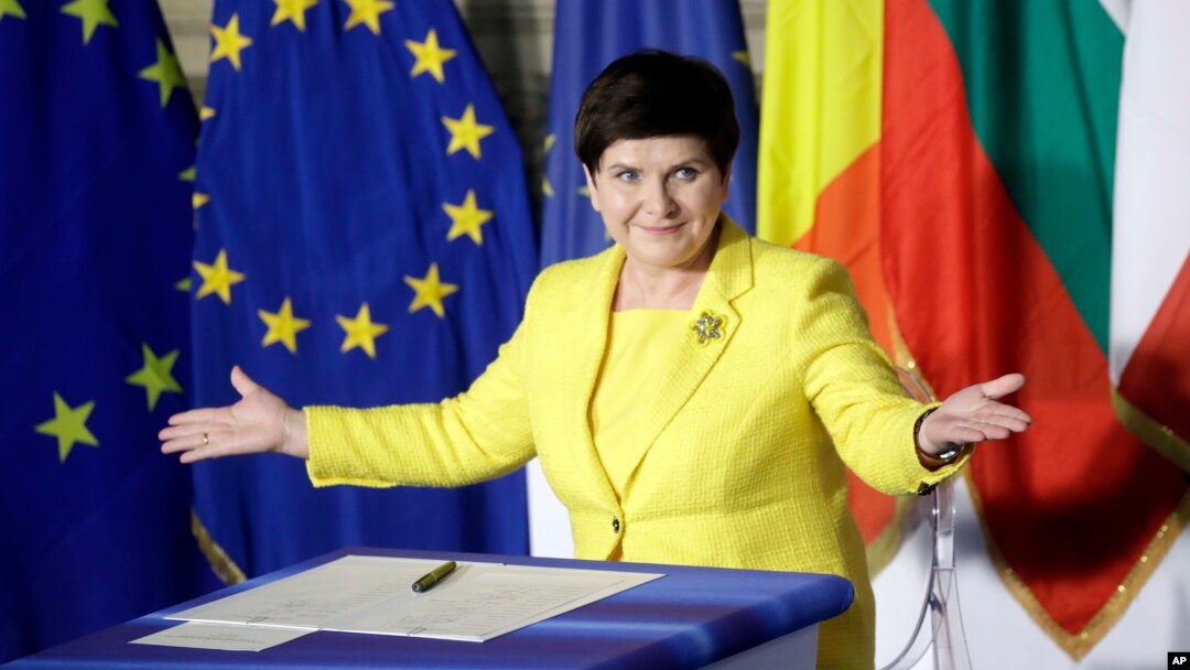 Polish Prime Minister Beata Szydto gestures after signing a declaration during an EU summit meeting at the Orazi and Curiazi Hall in the Palazzo dei Conservatori in Rome, March 25, 2017.