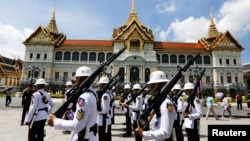 Soldiers are seen during a changing of the guard inside the Grand Palace days before the King's coronation in Bangkok, Thailand, April 30, 2019. 