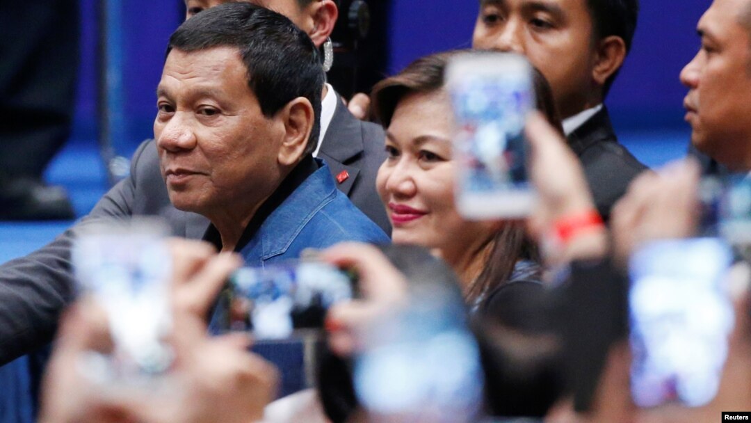 Philippine President Rodrigo Duterte arrives at an event with Filipino community in Hong Kong, April 12, 2018.