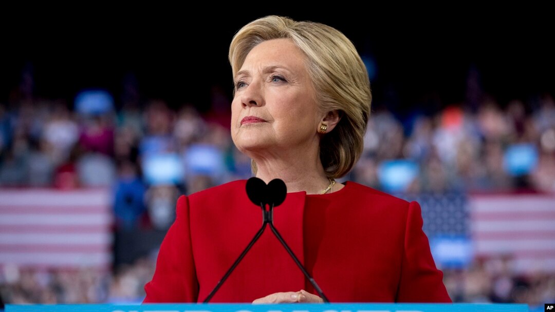 Democratic presidential candidate Hillary Clinton pauses as she speaks during a campaign rally in Raleigh, N.C., Nov. 8, 2016. 