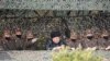 No Mask, No Mistake for North Korea's Kim