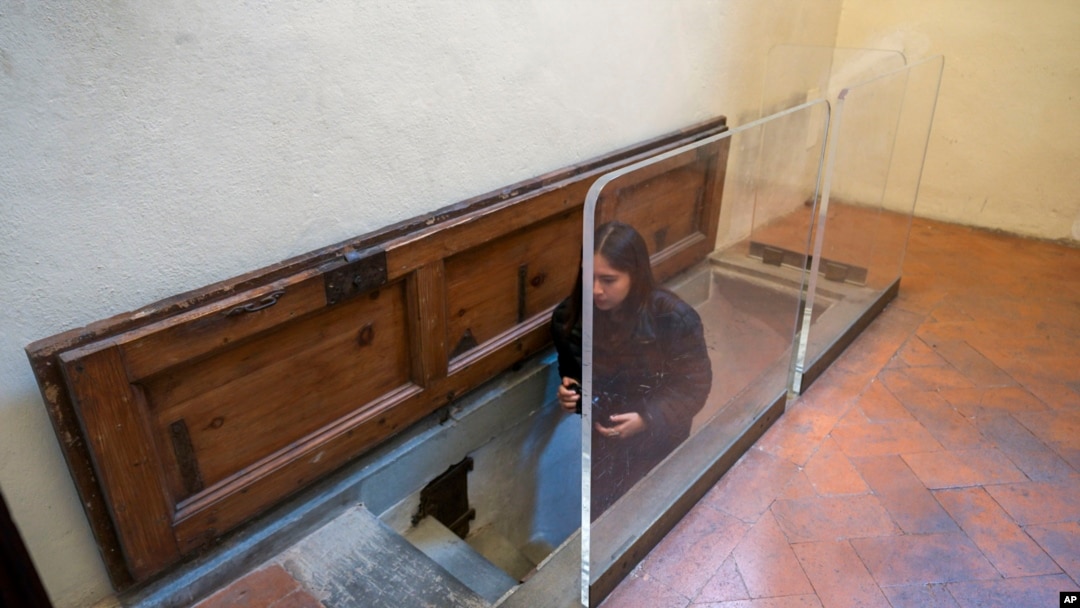 The trapdoor leading to a room with delicate charcoal drawings on the walls that some experts have attributed to Michelangelo is seen inside Florence's Medici Chapel, in central Italy, Tuesday, Oct. 31, 2023. (AP Photo/Luigi Navarra)