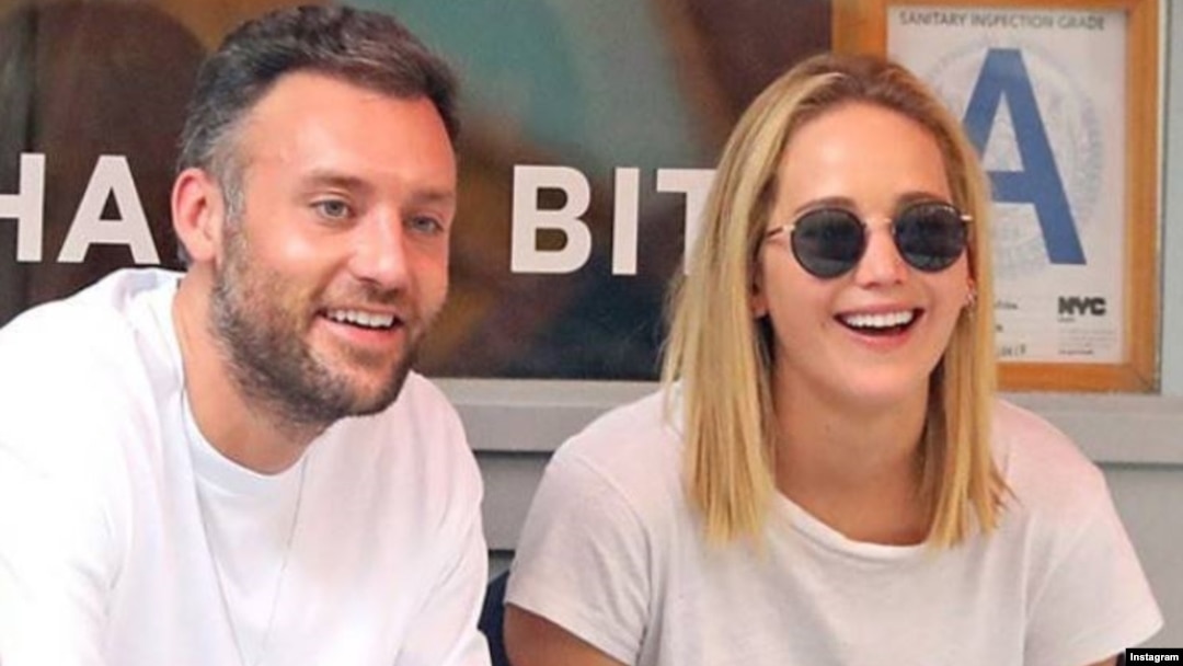 Oscar-winning actress Jennifer Lawrence, right, and now-fiance Cooke Maroney are seen in this undated photo.
