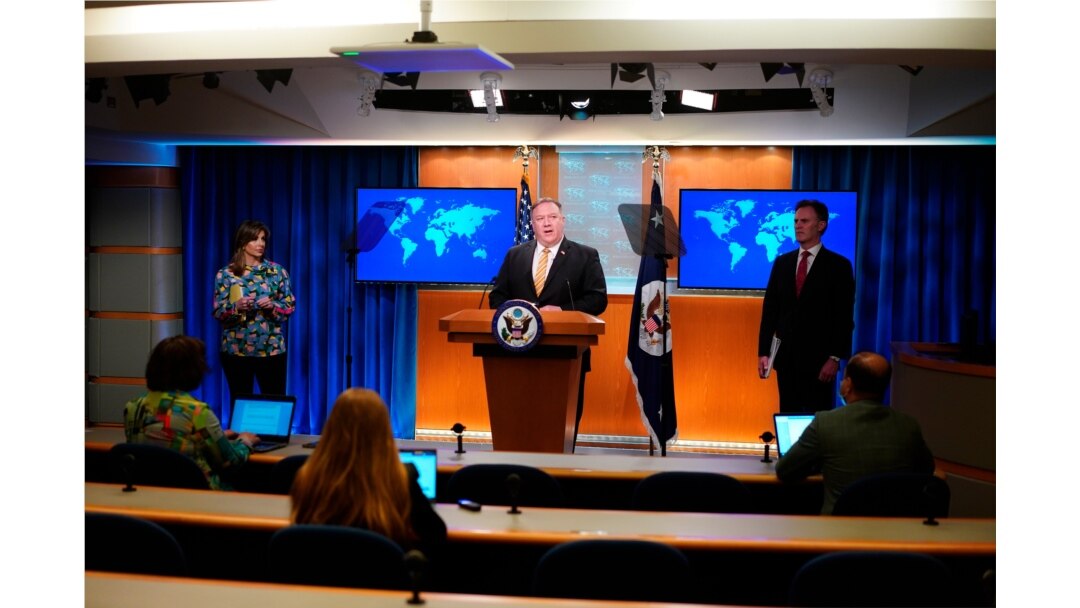 FILE - Secretary of State Pompeo speaks during a press conference at the State Department, June 24, 2020 in Washington.