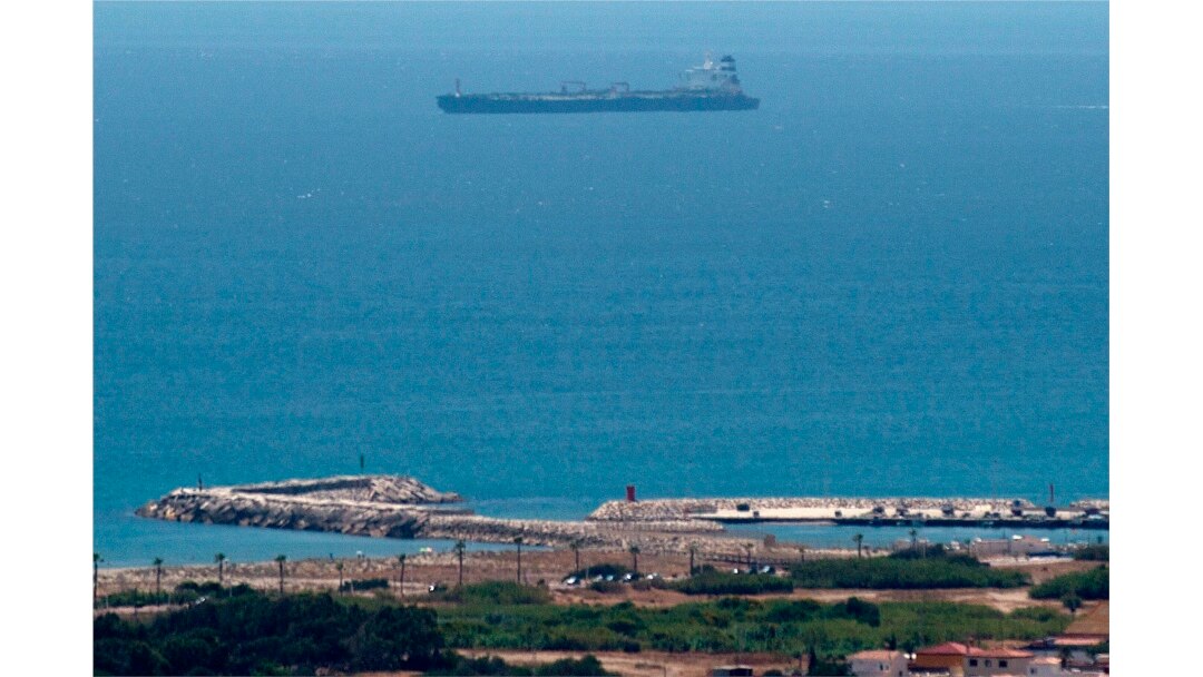 A picture taken from La Linea de la Concepcion in southern Spain shows supertanker Grace 1 suspected of carrying crude oil to Syria in violation of EU sanctions after it was detained in Gibraltar on July 4, 2019.