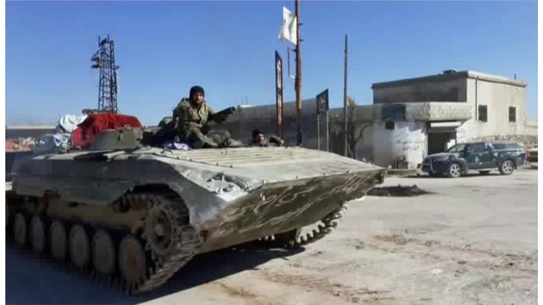 Syrian army soldiers advance on the town of Kfar Nabl, Syria, in this still image taken from a video obtained by Reuters and shot on March 2, 2020.