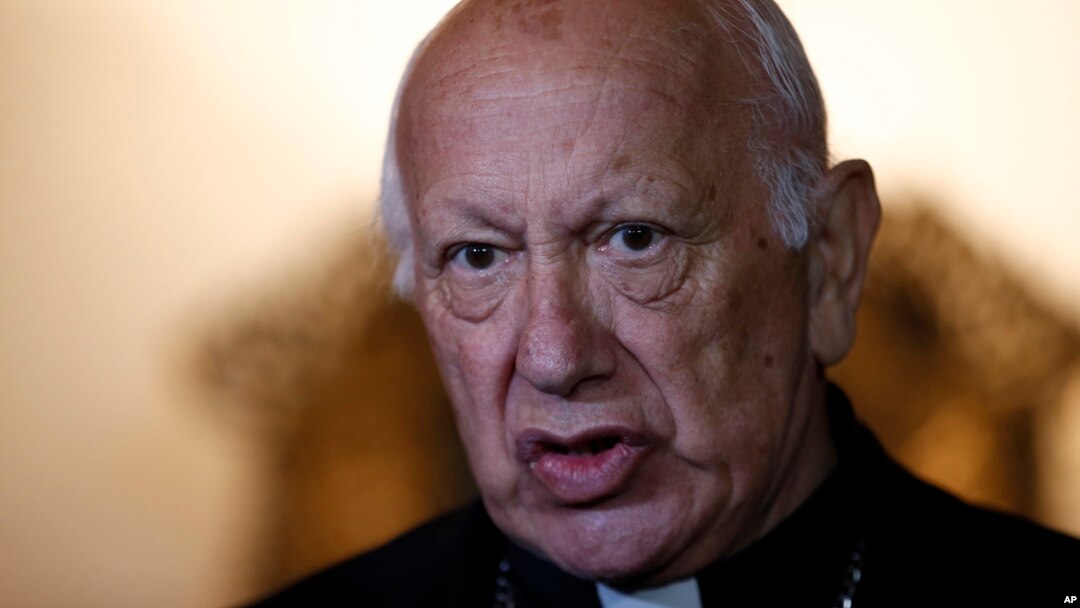 The archbishop of Santiago, Ricardo Ezzati, speaks to the press after his first Mass, after returning from the Vatican, in Santiago, May 18, 2018. 