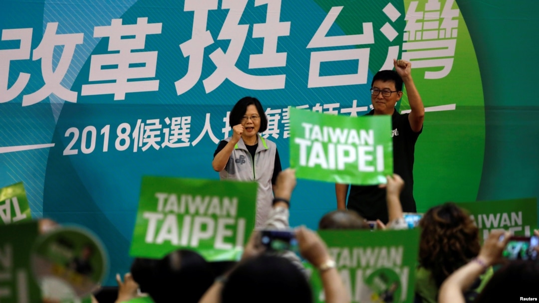 Taiwanese President Tsai Ing-wen and Democratic Progressive Party (DPP) Taipei mayoral candidate Pasuya Yao, attend a mayoral and magisterial election campaign rally in Taipei, Taiwan, Aug. 3, 2018.