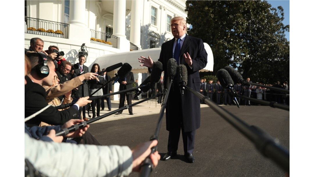President Donald Trump speaks to reporters on the South Lawn of the White House in Washington, Nov. 8, 2019.