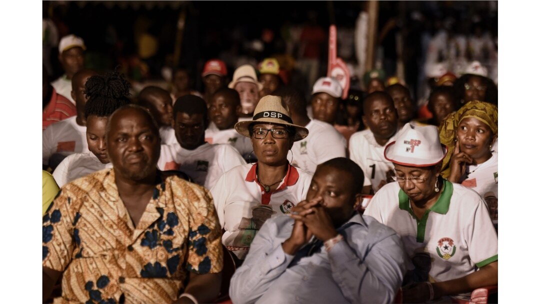 Supporters of presidential candidate Domingos Simoes Pereira (DSP) from the traditional ruling African Party for the Independence of Guinea-Bissau and Cape Verde (PAIGC) attend a rally at Nino Correa stadium in Bissau, on Dec. 27, 2019.