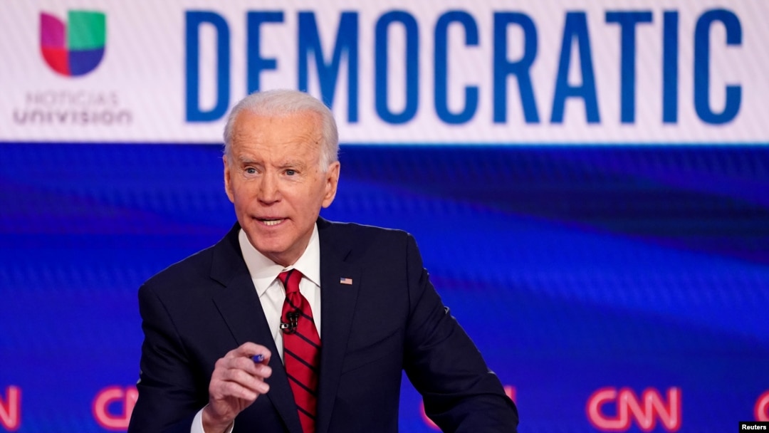 FILE - Democratic U.S. presidential candidate Joe Biden speaks during the 11th Democratic candidates debate of the 2020 presidential campaign, held in CNN's Washington studios on March 15, 2020.