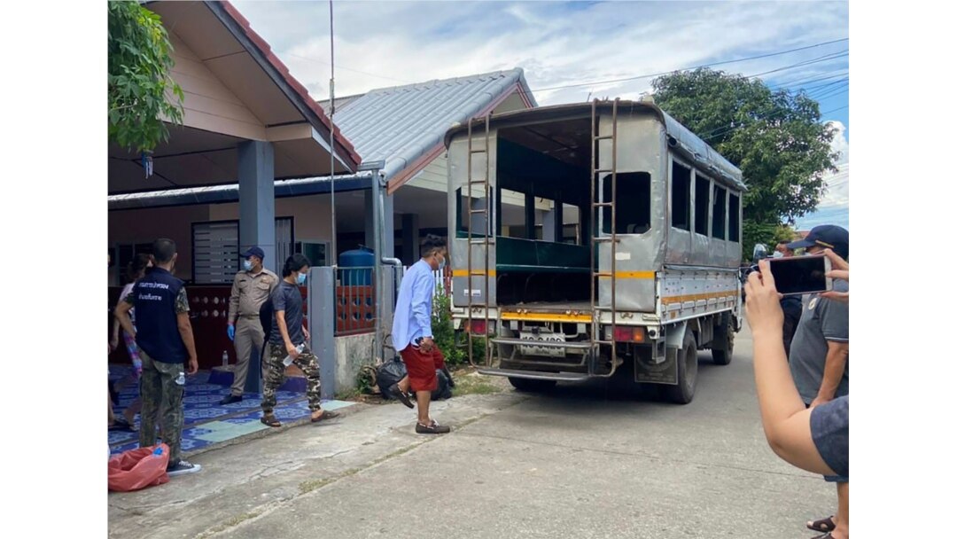 In this photo released by the San Sai District Administrative Office, journalists working for Democratic Voice of Burma prepare to get into a van after being arrested, May 9, 2021.