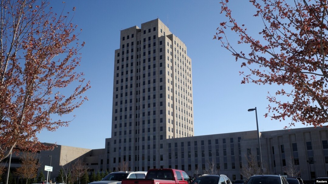 FILE - The North Dakota State Capitol is seen in Bismarck, North Dakota, Oct. 26, 2020. For the first time in state history, the North Dakota House voted to expel a lawmaker on March 4, 2021. 