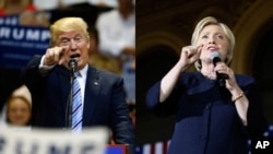 FILE - Republican Donald Trump and Democrat Hillary Clinton both postponed major campaign events after the enormity of the attack in Texas became clear early Friday, but they have since issued statements online.