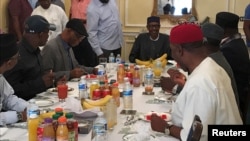 Nigeria's President Muhammadu Buhari receives a delegation of the All Progressives Congress (APC) party in Abuja House in London, Britain, July 23, 2017.