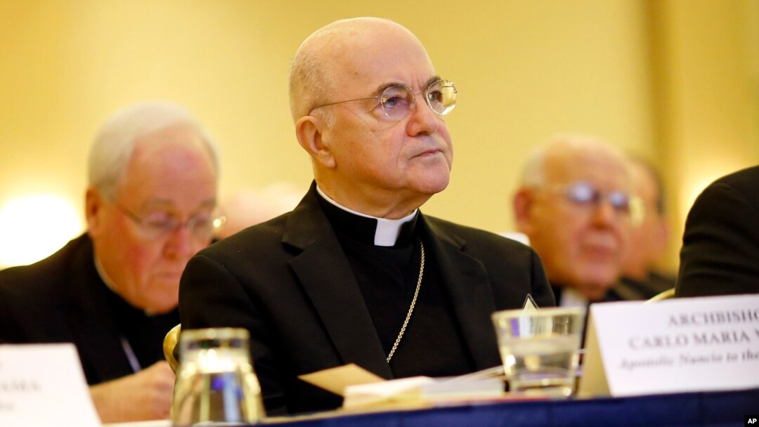 FILE - Archbishop Carlo Maria Vigano, Apostolic Nuncio to United States, listens to remarks at the United States Conference of Catholic Bishops' annual fall meeting in Baltimore, Maryland, Nov. 16, 2015.