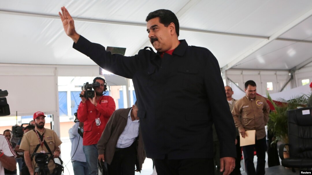 Venezuela's President Nicolas Maduro gestures during a meeting with supporters in Caracas, Venezuela, July 26, 2017.