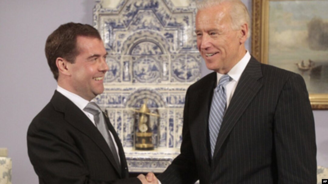 U.S. Vice President Joe Biden (R) shakes hands with Russia's President Dmitry Medvedev during their meeting in the presidential residence at Gorki, outside Moscow March 9, 2011.