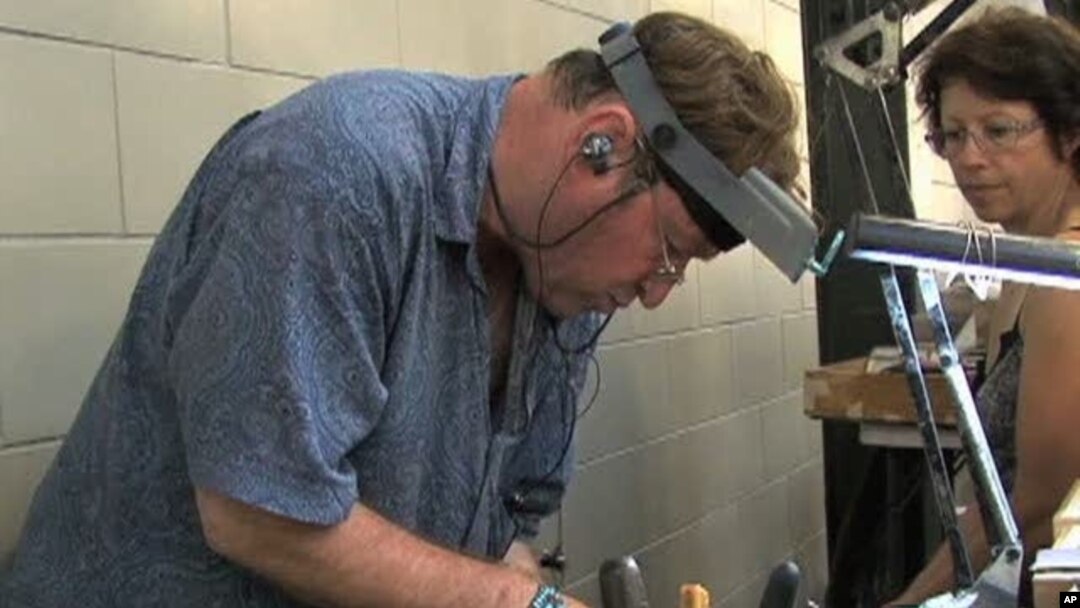 New Orleans resident Stefano Velaska makes jewelery from scraps of metal left by Katrina
