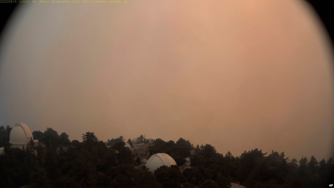 This photo provided by High Performance Wireless Research and Education Network and ALERTWildfire from a camera atop Mount Wilson shows dense smoke shrouding the famed Southern California observatory, Sept. 16, 2020.