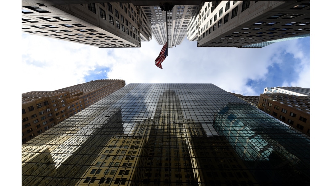 The Chrysler Building is reflected in the side of the Grand Hyatt Hotel in midtown Manhattan, New York City, March 3, 2017.