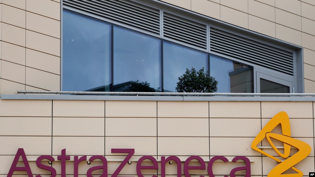 FILE - AstraZeneca offices and its corporate logo are seen on a building in Cambridge, Britain, July 18, 2020. 