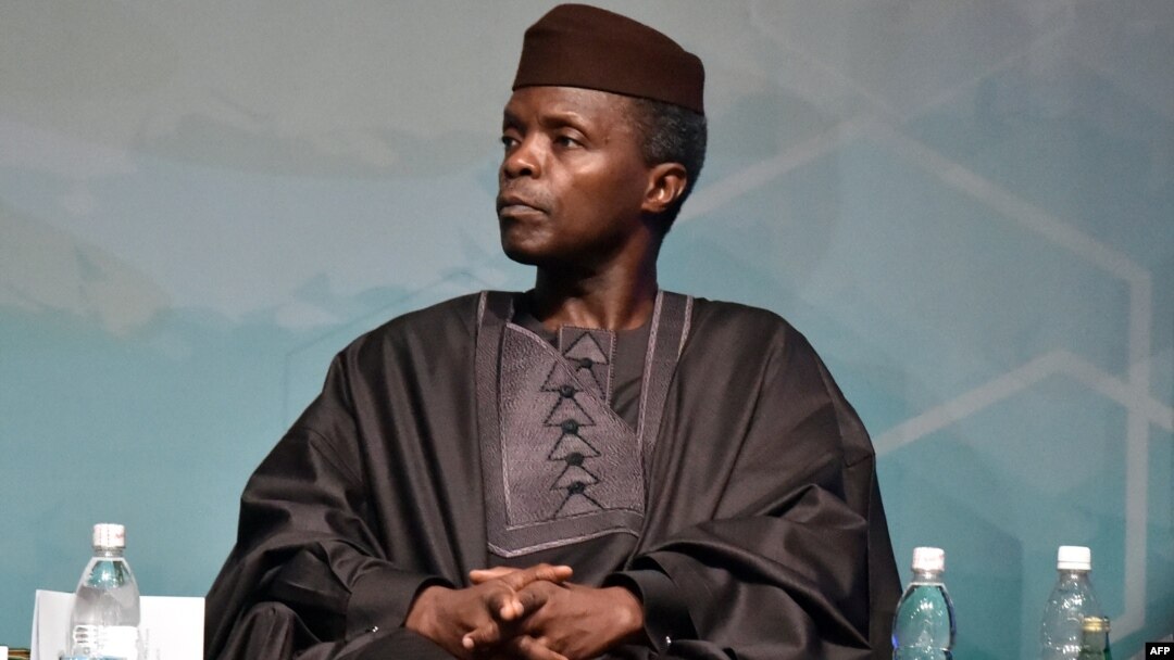FILE- Nigeria Vice President Yemi Osinbajo attend the investiture ceremony for the new president of the African Development Bank (AfDB) Akinwumi Adesina, on Sept. 1, 2015, in Abidjan. 