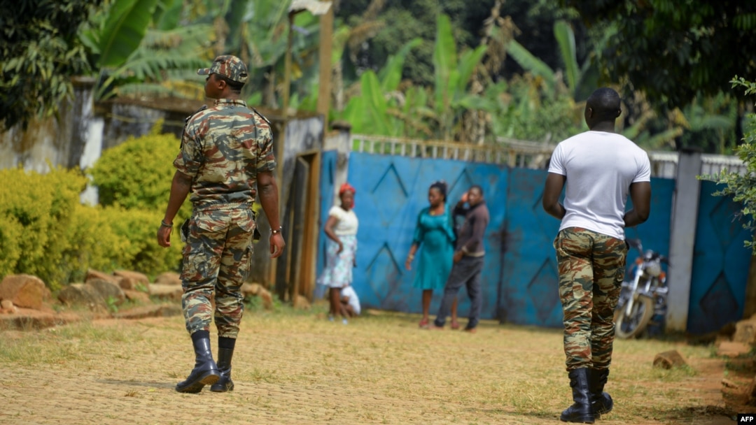 FILE - Soldiers patrol in Bafut, in the northwest English-speaking region of Cameroon, Nov. 15, 2017. 